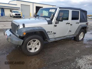 2008 Jeep Wrangler Unlimited X with VIN 1J4GB39138L517920, listed as a Copart auction lot 76541144 with 213,002 mi miles and Salvage Title. Bid and sale history available at DreamBid. Image 1.