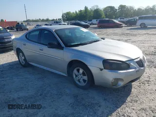 2007 Pontiac Grand Prix with VIN 2G2WP552071153266, listed as a IAAI auction lot 41986172 with 227,909 mi miles. Bid and sale history available at carsss.com. Image 1.