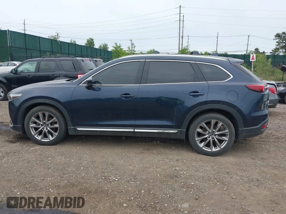 2018 Mazda CX-9 Grand Touring with VIN JM3TCBDY8J0209737, listed as a IAAI auction lot 42374826 with Not provided miles and . Bid and sale history available at DreamBid. Image 13.
