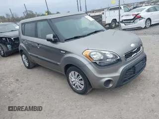 2013 Kia Soul with VIN KNDJT2A53D7636040, listed as a IAAI auction lot 40979461 with 122,530 mi miles. Bid and sale history available at carsss.com. Image 1.