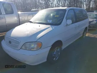 2005 Kia Sedona LX with VIN KNDUP132756764528, listed as a IAAI auction lot 41709414 with 999,999 mi miles. Bid and sale history available at carsss.com. Image 2.