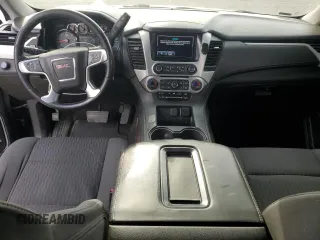 2019 GMC Yukon SLE with VIN 1GKS1AKC2KR101675, listed as a Copart auction lot 87256804 with 144,572 mi miles and Salvage Title. Bid and sale history available at carsss.com. Image 8.