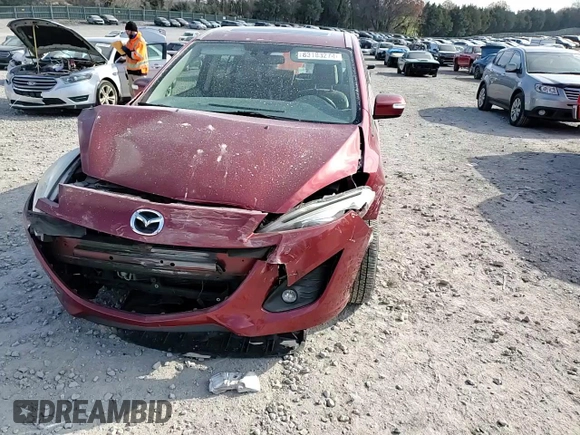 2015 Mazda 5 Grand Touring z VIN JM1CW2DL9F0182785, wystawiony jako Copart lot #83183274 z przebiegiem 71 725 mil mil oraz Szkoda całkowita • Salvage title. Historia ofert i sprzedaży dostępna na DreamBid. Obrazek 11.