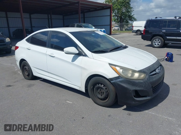 2014 Hyundai Accent GLS with VIN KMHCT4AE1EU590386, listed as a IAAI auction lot 42155202 with 248,545 mi miles. Bid and sale history available at carsss.com. Image 1.