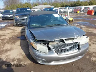 1999 Chrysler Sebring JXi z VIN 3C3EL55H9XT539906, wystawiony jako IAAI lot #41556276 z przebiegiem Nie podano mil oraz . Historia ofert i sprzedaży dostępna na DreamBid. Obrazek 1.