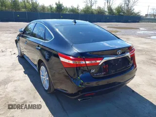 2015 Toyota Avalon Limited with VIN 4T1BK1EB4FU167932, listed as a IAAI auction lot 41802739 with 132,690 mi miles and . Bid and sale history available at DreamBid. Image 3.