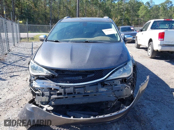 2017 Chrysler Pacifica Limited with VIN 2C4RC1GG1HR512911, listed as a IAAI auction lot 41850887 with 147,403 mi miles and . Bid and sale history available at DreamBid. Image 12.