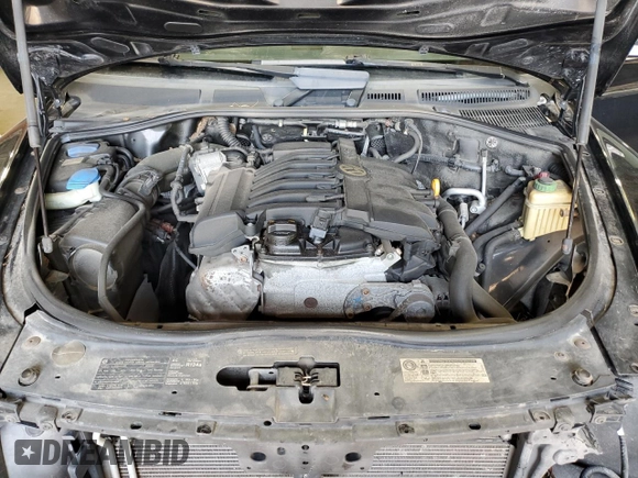 2010 Volkswagen Touareg VR6 with VIN WVGBF7A99AD002591, listed as a Copart auction lot 70624234 with 154,330 mi miles and Salvage Title. Bid and sale history available at DreamBid. Image 12.