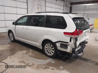2013 Toyota Sienna LE with VIN 5TDJK3DC2DS049479, listed as a IAAI auction lot 41322671 with 108,436 mi miles and . Bid and sale history available at DreamBid. Image 3.