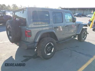 2020 Jeep Wrangler Unlimited Rubicon with VIN 1C4HJXFN4LW136516, listed as a IAAI auction lot 41874403 with 87,576 mi miles. Bid and sale history available at carsss.com. Image 4.