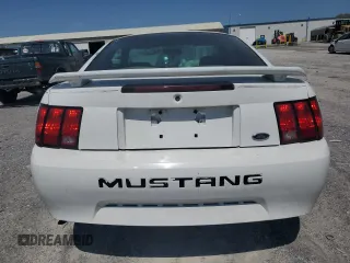 2001 Ford Mustang Standard с VIN 1FAFP40421F101044, выставлен на аукционе Copart как лот 52943495 с пробегом 209 408 миль миль и Списание • Salvage title. История ставок и продаж доступна на DreamBid. Изображение 6.