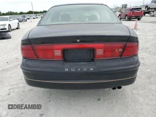 1999 Buick Regal LS with VIN 2G4WB52K9X1408636, listed as a Copart auction lot 50533055 with 0 mi miles and Salvage Title. Bid and sale history available at carsss.com. Image 6.