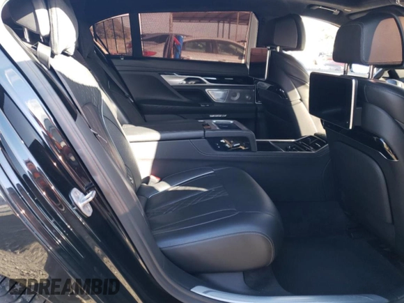 2018 BMW 7 Series M760i xDrive with VIN WBA7H6C50JG614781, listed as a Copart auction lot 83689234 with 49,873 mi miles and Salvage Title. Bid and sale history available at carsss.com. Image 10.