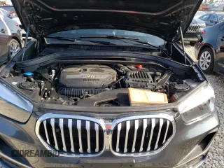 2021 BMW X1 xDrive28i with VIN WBXJG9C09M5T96327, listed as a Copart auction lot 49876493 with 42,572 mi miles. Bid and sale history available at carsss.com. Image 12.