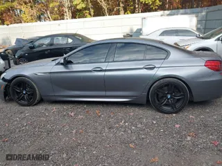 2016 BMW 6 Series 640i xDrive with VIN WBA6D2C50GGT66007, listed as a IAAI auction lot 40673899 with 73,695 mi miles. Bid and sale history available at carsss.com. Image 14.
