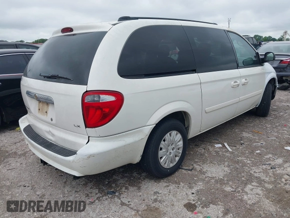 2005 Chrysler Town & Country LX with VIN 2C4GP44RX5R590022, listed as a IAAI auction lot 42058881 with 191,272 mi miles and . Bid and sale history available at DreamBid. Image 4.