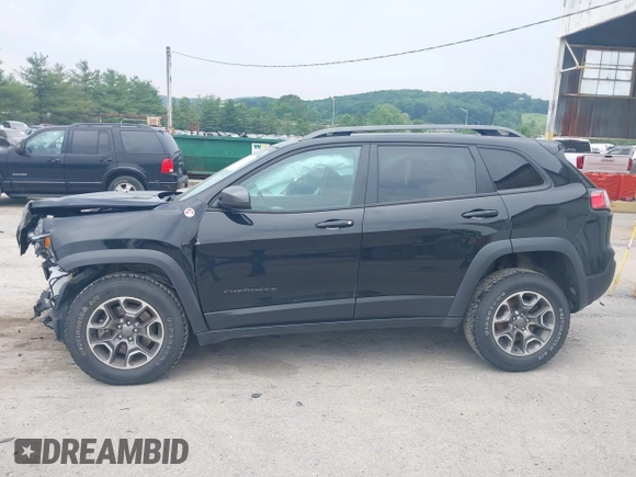 2021 Jeep Cherokee Trailhawk with VIN 1C4PJMBX0MD167941, listed as a IAAI auction lot 42507379 with 70,414 mi miles and . Bid and sale history available at DreamBid. Image 15.