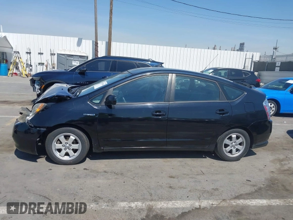 2007 Toyota Prius with VIN JTDKB20UX73228033, listed as a IAAI auction lot 41851668 with 242,138 mi miles. Bid and sale history available at carsss.com. Image 14.
