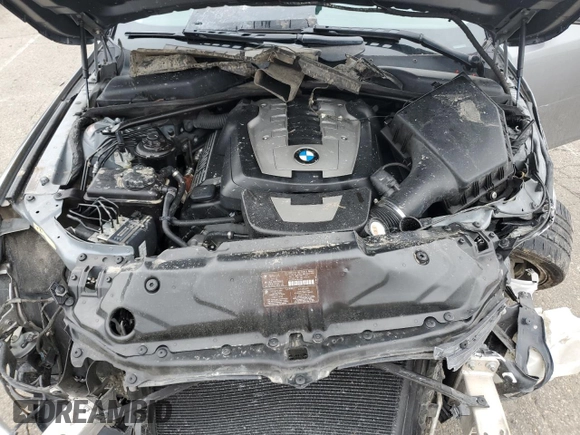2008 BMW 5 Series 550i z VIN WBANW53598CT54180, wystawiony jako Copart lot #52365055 z przebiegiem 117 343 mil mil oraz Szkoda całkowita • Salvage title. Historia ofert i sprzedaży dostępna na DreamBid. Obrazek 11.