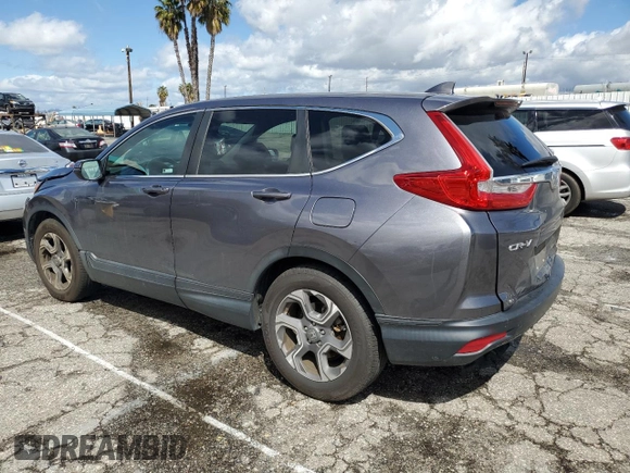 2019 Honda CR-V EX with VIN 7FARW1H52KE024241, listed as a Copart auction lot 46445733 with 54,145 mi miles and . Bid and sale history available at DreamBid. Image 2.