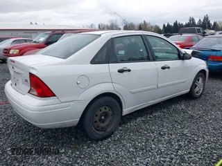 2004 Ford Focus ZTS with VIN 1FAFP38Z34W137002, listed as a IAAI auction lot 41867443 with 185,862 mi miles and . Bid and sale history available at carsss.com. Image 4.