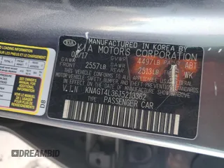 2018 Kia Optima LX z VIN KNAGT4L36J5213362, wystawiony jako Copart lot #56749365 z przebiegiem 122 662 mil mil oraz Szkoda całkowita • Salvage title. Historia ofert i sprzedaży dostępna na DreamBid. Obrazek 12.