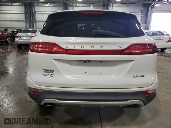 2015 Lincoln MKC z VIN 5LMTJ2AH7FUJ02335, wystawiony jako Copart lot #48035155 z przebiegiem 112 171 mil mil oraz Czysty tytuł • Clean title. Historia ofert i sprzedaży dostępna na DreamBid. Obrazek 6.