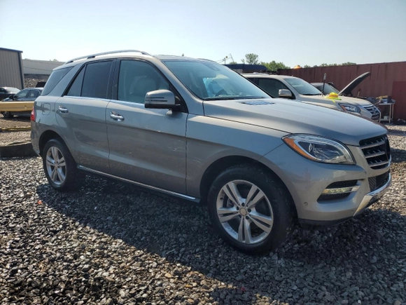 2014 Mercedes-Benz M 350 with VIN 4JGDA2EB4EA406865, listed as a Copart auction lot 61630045 with 142,616 mi miles and Salvage title. Bid and sale history available at DreamBid. Image 4.