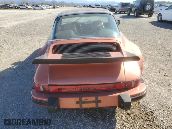 1974 Porsche 911 with VIN 9114111882, listed as a Copart auction lot 47080465 with 4,828 mi miles and Salvage title. Bid and sale history available at DreamBid. Image 6.