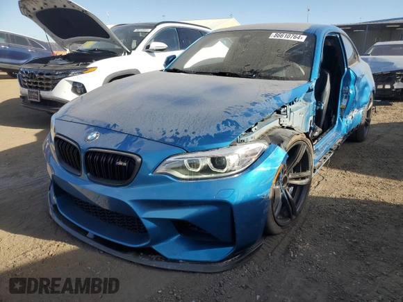 2016 BMW M2 with VIN WBS1H9C52GV351930, listed as a Copart auction lot 86610764 with 55,473 mi miles and Salvage Title. Bid and sale history available at carsss.com. Image 1.