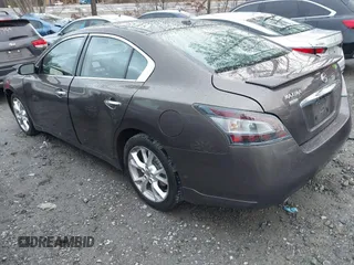2013 Nissan Maxima SV z VIN 1N4AA5AP5DC819199, wystawiony jako IAAI lot #41519631 z przebiegiem 122 934 mil mil oraz . Historia ofert i sprzedaży dostępna na DreamBid. Obrazek 3.