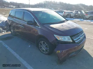2011 Honda Odyssey EX-L with VIN 5FNRL5H67BB066392, listed as a IAAI auction lot 41384314 with 270,635 mi miles. Bid and sale history available at carsss.com. Image 1.