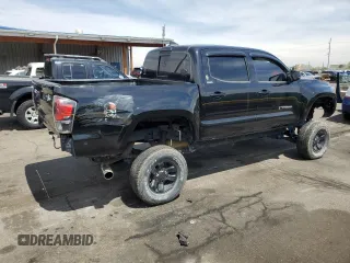 2019 Toyota Tacoma SR z VIN 3TMCZ5AN1KM253032, wystawiony jako Copart lot #52598445 z przebiegiem 69 489 mil mil oraz Szkoda całkowita • Salvage title. Historia ofert i sprzedaży dostępna na DreamBid. Obrazek 3.