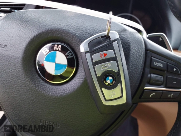 2014 BMW 7 Series 740Li with VIN WBAYE4C51ED138744, listed as a IAAI auction lot 42254213 with 116,157 mi miles and . Bid and sale history available at DreamBid. Image 11.