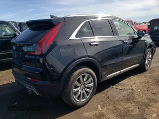 2021 Cadillac XT4 AWD Premium Luxury with VIN 1GYFZDR41MF002835, listed as a Copart auction lot 49384424 with 9,984 mi miles and Salvage Title. Bid and sale history available at carsss.com. Image 3.