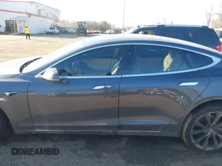 2019 Tesla Model S 75D with VIN 5YJSA1E2XKF331744, listed as a IAAI auction lot 41483173 with Not provided miles and . Bid and sale history available at DreamBid. Image 14.