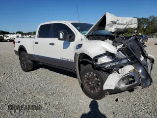 2018 Nissan Titan XD PRO-4X with VIN 1N6BA1F40JN539063, listed as a Copart auction lot 75825304 with 0 mi miles and Salvage Title. Bid and sale history available at carsss.com. Image 4.