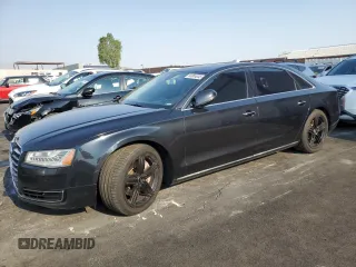 2015 Audi A8 3.0T z VIN WAU3GAFD2FN011129, wystawiony jako Copart lot #64904045 z przebiegiem 147 549 mil mil oraz Czysty tytuł • Clean title. Historia ofert i sprzedaży dostępna na DreamBid. Obrazek 1.