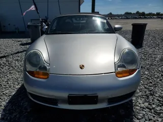 1998 Porsche Boxster z VIN WP0CA298XWU622217, wystawiony jako Copart lot #49441925 z przebiegiem 120 638 mil mil oraz Szkoda całkowita • Salvage title. Historia ofert i sprzedaży dostępna na DreamBid. Obrazek 5.