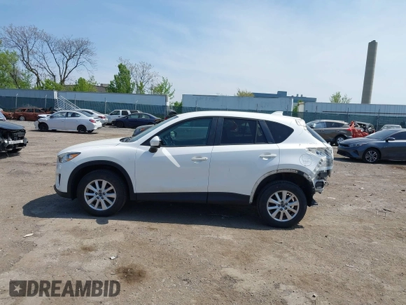 2013 Mazda CX-5 Touring with VIN JM3KE4CE1D0136241, listed as a IAAI auction lot 42119260 with 106,913 mi miles and . Bid and sale history available at carsss.com. Image 14.