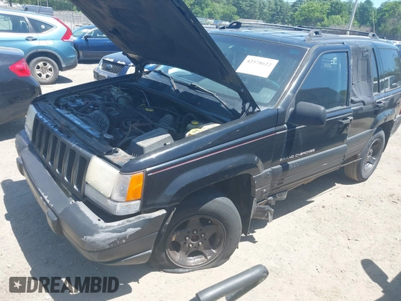 1997 Jeep Grand Cherokee Laredo with VIN 1J4GZ58S3VC508194, listed as a IAAI auction lot 42578622 with 146,559 mi miles and . Bid and sale history available at DreamBid. Image 2.