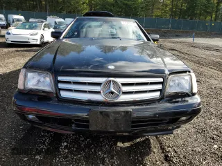 1997 Mercedes-Benz SL-Class with VIN WDBFA63F7VF145758, listed as a Copart auction lot 77503244 with 132,664 mi miles and Clean Title. Bid and sale history available at carsss.com. Image 5.