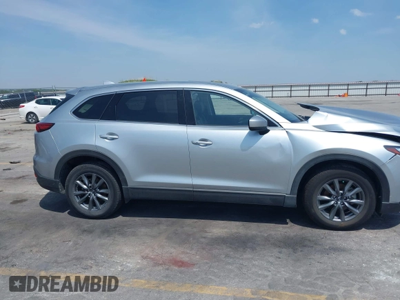 2020 Mazda CX-9 Touring with VIN JM3TCBCY2L0415513, listed as a IAAI auction lot 42481543 with 47,294 mi miles and . Bid and sale history available at DreamBid. Image 13.