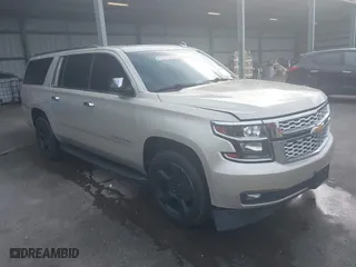2015 Chevrolet Suburban LT with VIN 1GNSKJKCXFR193706, listed as a IAAI auction lot 41693391 with 213,713 mi miles. Bid and sale history available at carsss.com. Image 1.