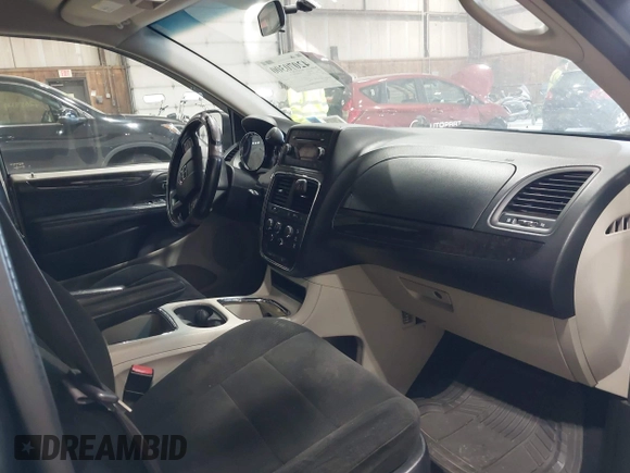 2012 Dodge Grand Caravan SXT with VIN 2C4RDGCG4CR224850, listed as a IAAI auction lot 42070300 with 177,982 mi miles and . Bid and sale history available at DreamBid. Image 5.