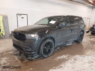 2015 Dodge Durango SXT with VIN 1C4RDJAG4FC133168, listed as a IAAI auction lot 41524022 with 142,881 mi miles. Bid and sale history available at carsss.com. Image 17.