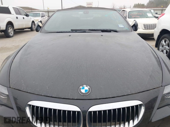 2007 BMW 6 Series M6 z VIN WBSEK93587CY78191, wystawiony jako IAAI lot #41703769 z przebiegiem Nie podano mil oraz . Historia ofert i sprzedaży dostępna na DreamBid. Obrazek 12.