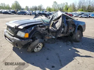 2003 Ford Ranger XL with VIN 1FTYR10UX3TA19062, listed as a Copart auction lot 53805185 with 134,982 mi miles and Salvage title. Bid and sale history available at DreamBid. Image 1.