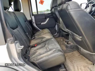 2015 Jeep Wrangler Unlimited Rubicon z VIN 1C4BJWFG0FL529310, wystawiony jako Copart lot #64337405 z przebiegiem Nie podano mil oraz Szkoda całkowita • Salvage title. Historia ofert i sprzedaży dostępna na DreamBid. Obrazek 10.