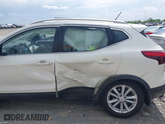 2017 Nissan Rogue SV with VIN JN1BJ1CR3HW100711, listed as a IAAI auction lot 42157090 with 106,067 mi miles and . Bid and sale history available at DreamBid. Image 6.